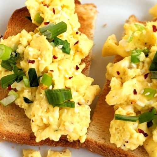 no salt scrambled eggs recipe low sodium eggs recipes healthy scrambled eggs with water sesame oil green onion chili flakes and scallions to top.