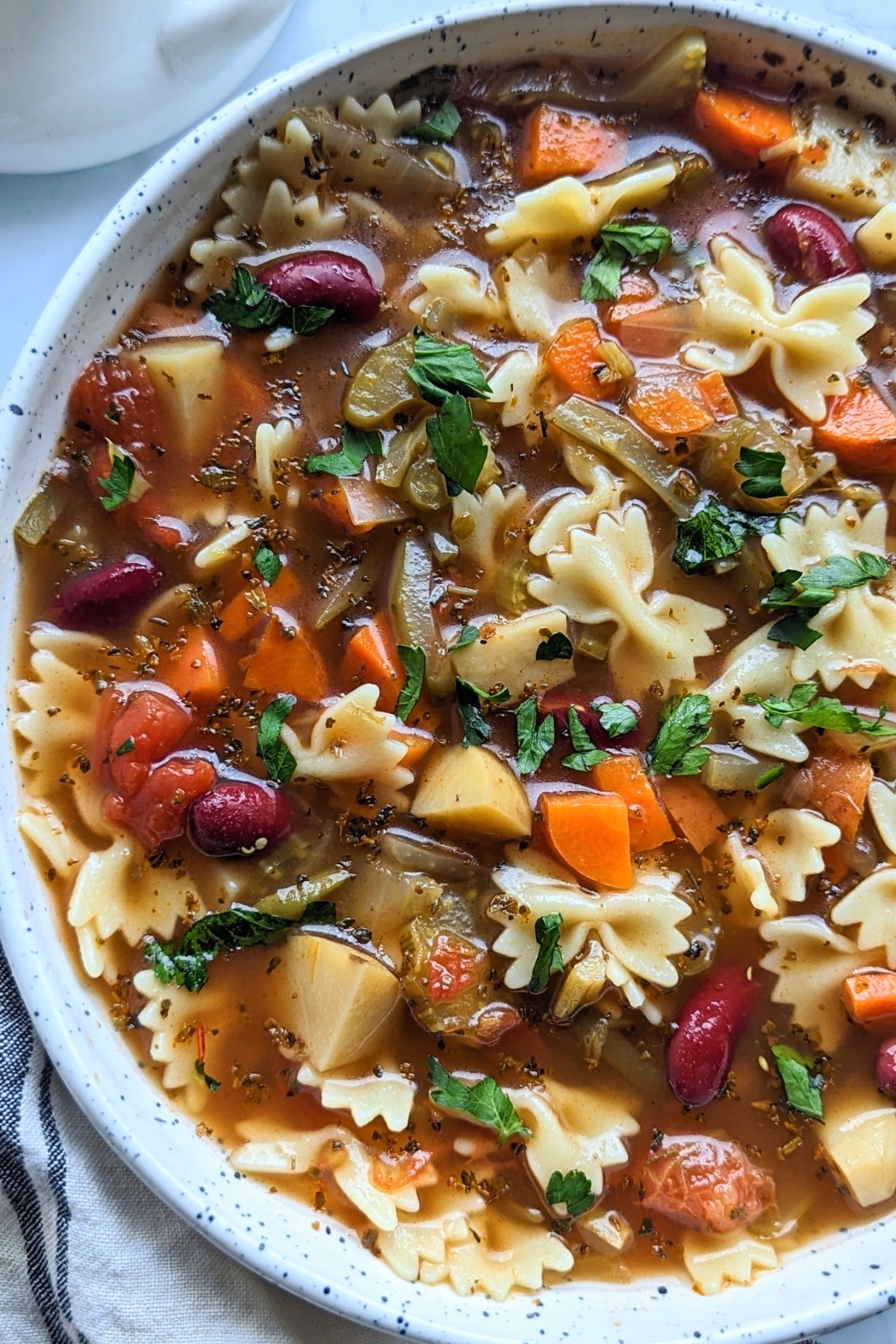 minestrone soup low sodium soups recipes without salt healthy soup with pasta beans and vegetables in a bowl.