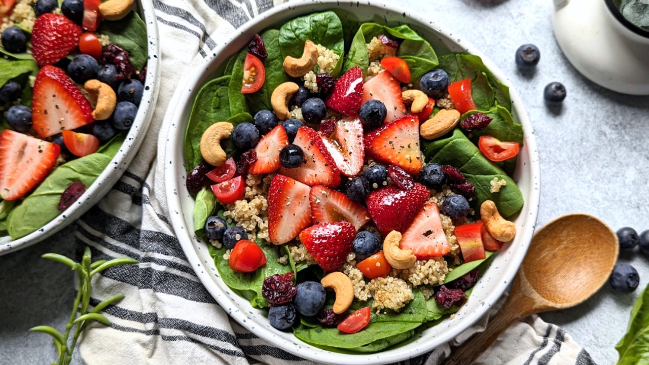 unsalted strawberry salad no salt added healthy salad with strawberries and berries and nuts over fresh baby spinach leaves for a great end of summer salad