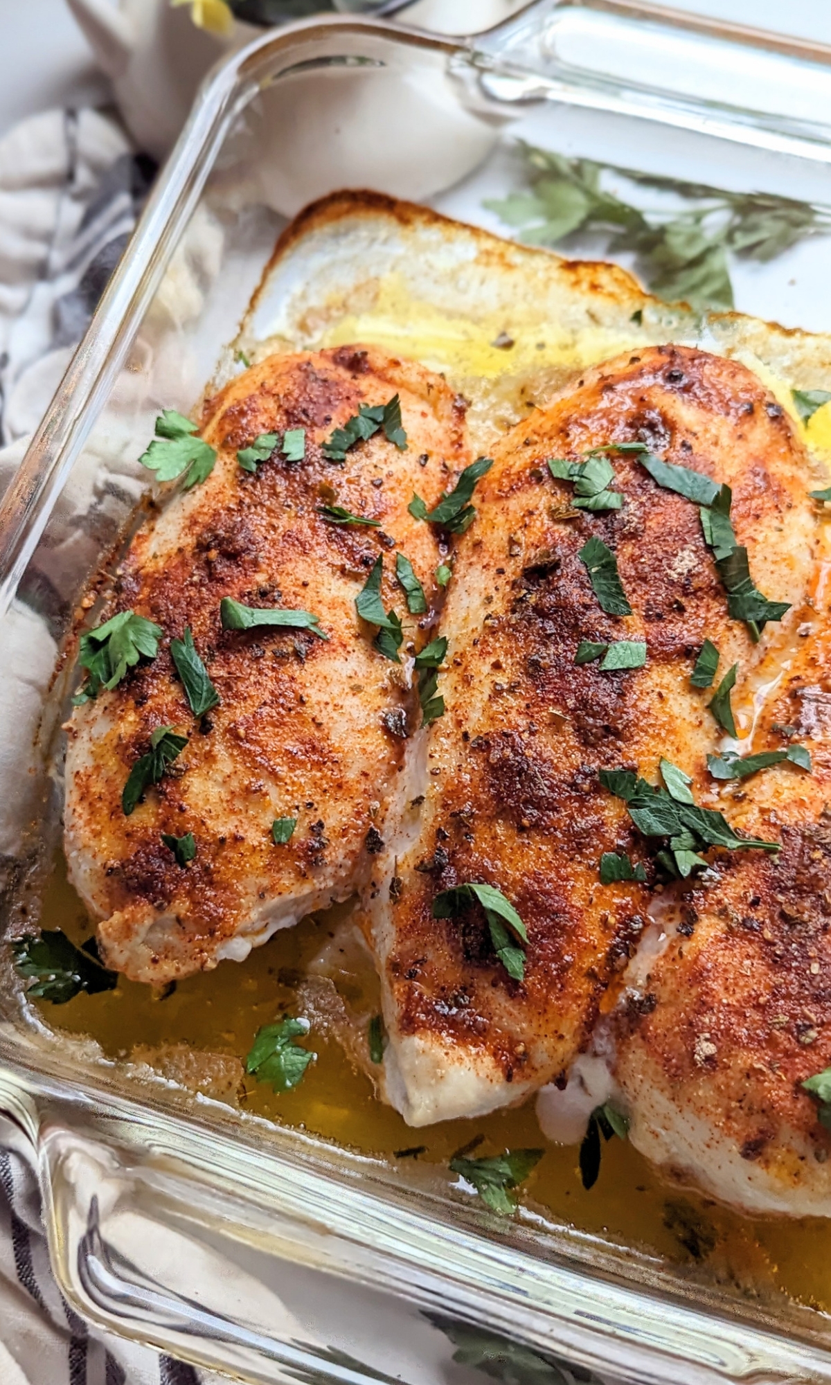 oven baked chicken breasts in olive oil and spices and topped with a salt free rub of spices herbs