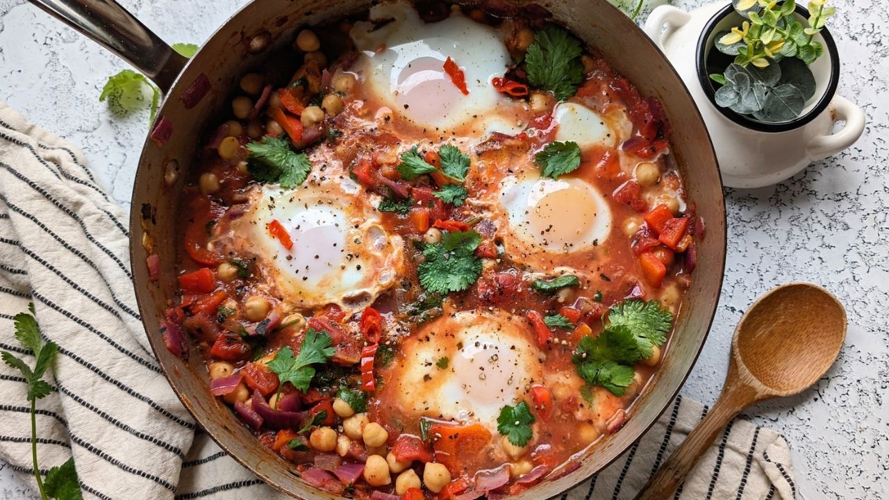 low salt shakshuka recipe with cilantro lime and eggs in one pan