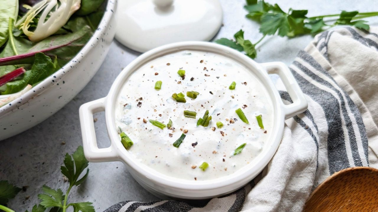 unsalted homemade ranch with fresh chives and fresh herbs with parsley and black peppercorns
