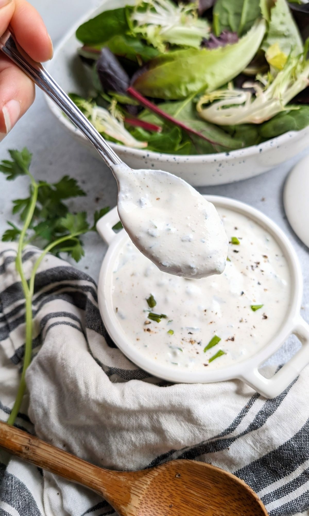no salt added ranch dressing recipe with chives parsley on a spoon with a salad