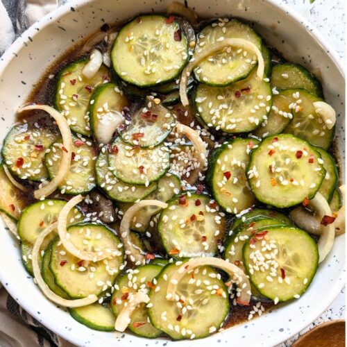 low sodium cucumber sesame salad recipe with onions chili flakes and fresh garlic in a unseasoned rice vinegar dressing