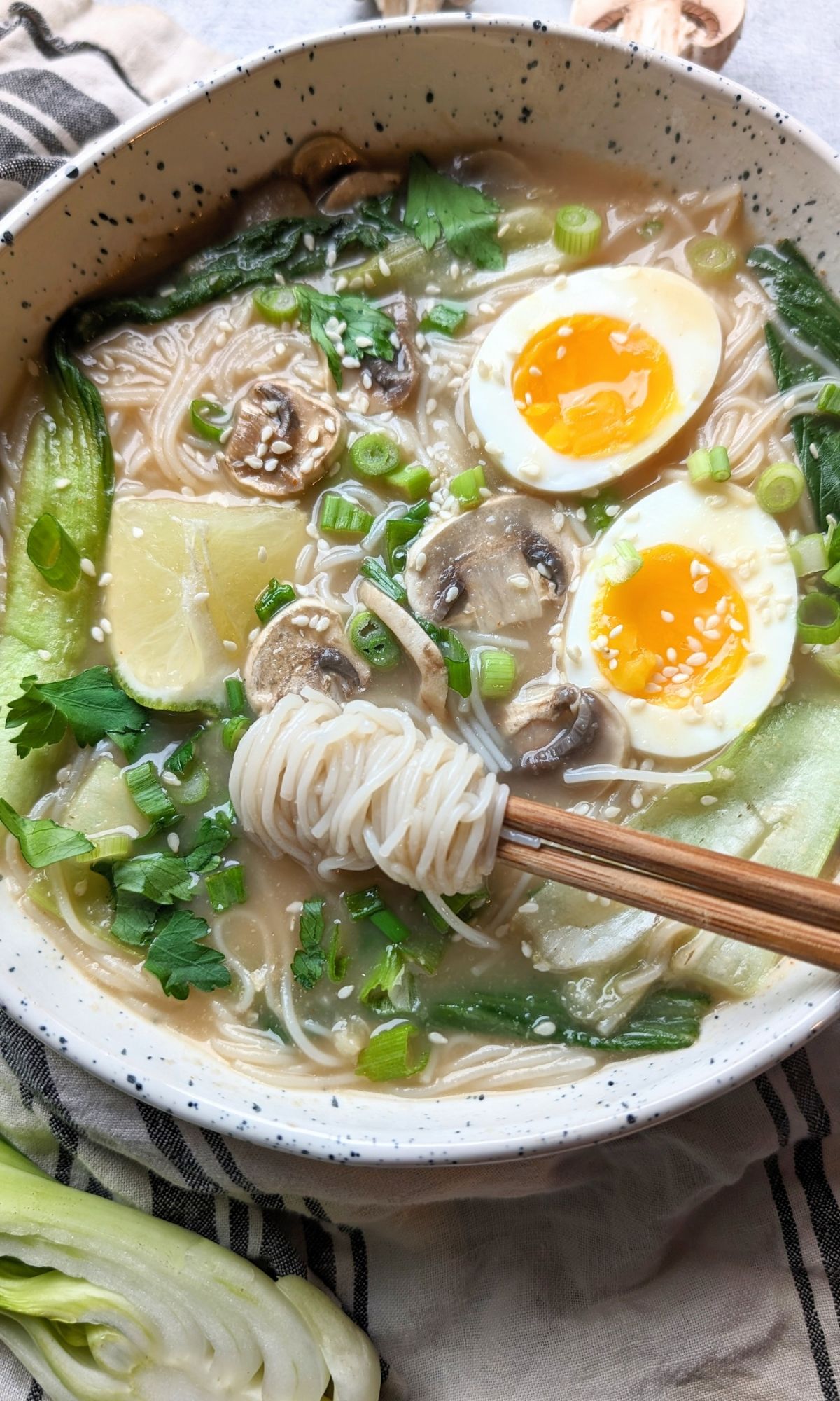 low salt ramen recipe with low sodium soup ingredients easy homemade ramen less salt and less sodium soup ideas to make at home for lunch or dinner with rice noodles and a ramen egg