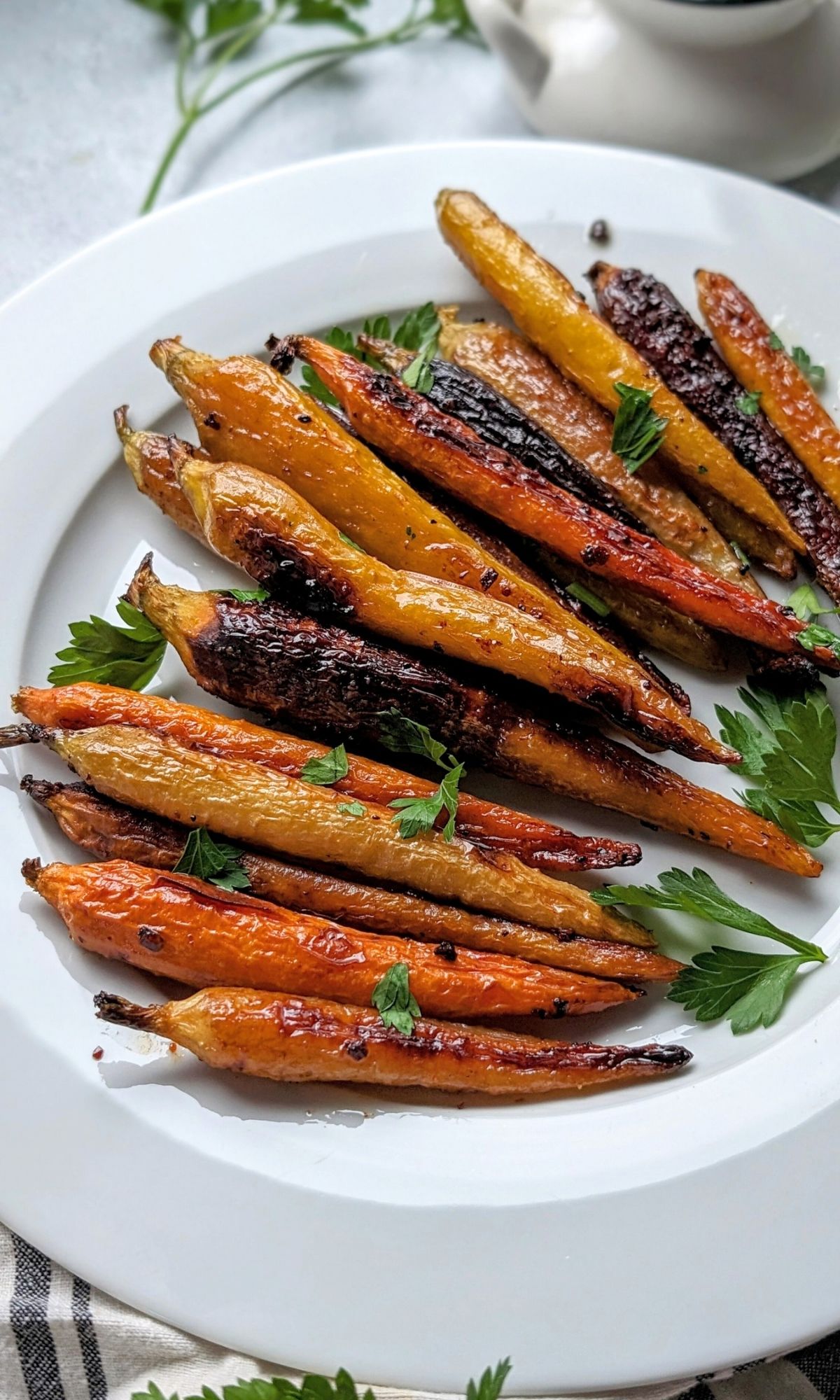 low sodium carrots with honey and thyme and fresh parsley on a plate arranged beautifully for a low sodium holiday appetizer for christmas or thanksgiving or easter