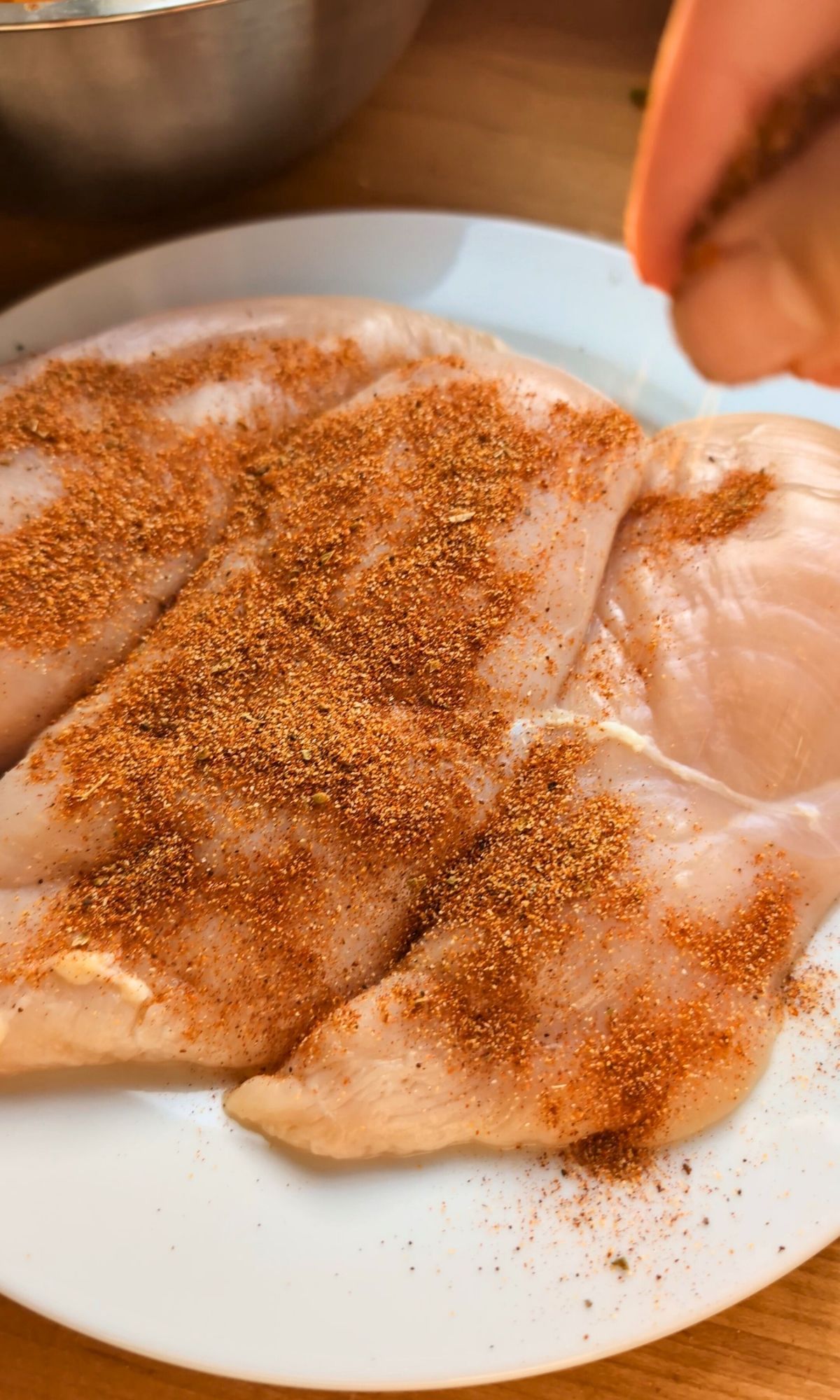 low sodium chicken breasts coated with a no salt seasoning as a dry rub on a plate