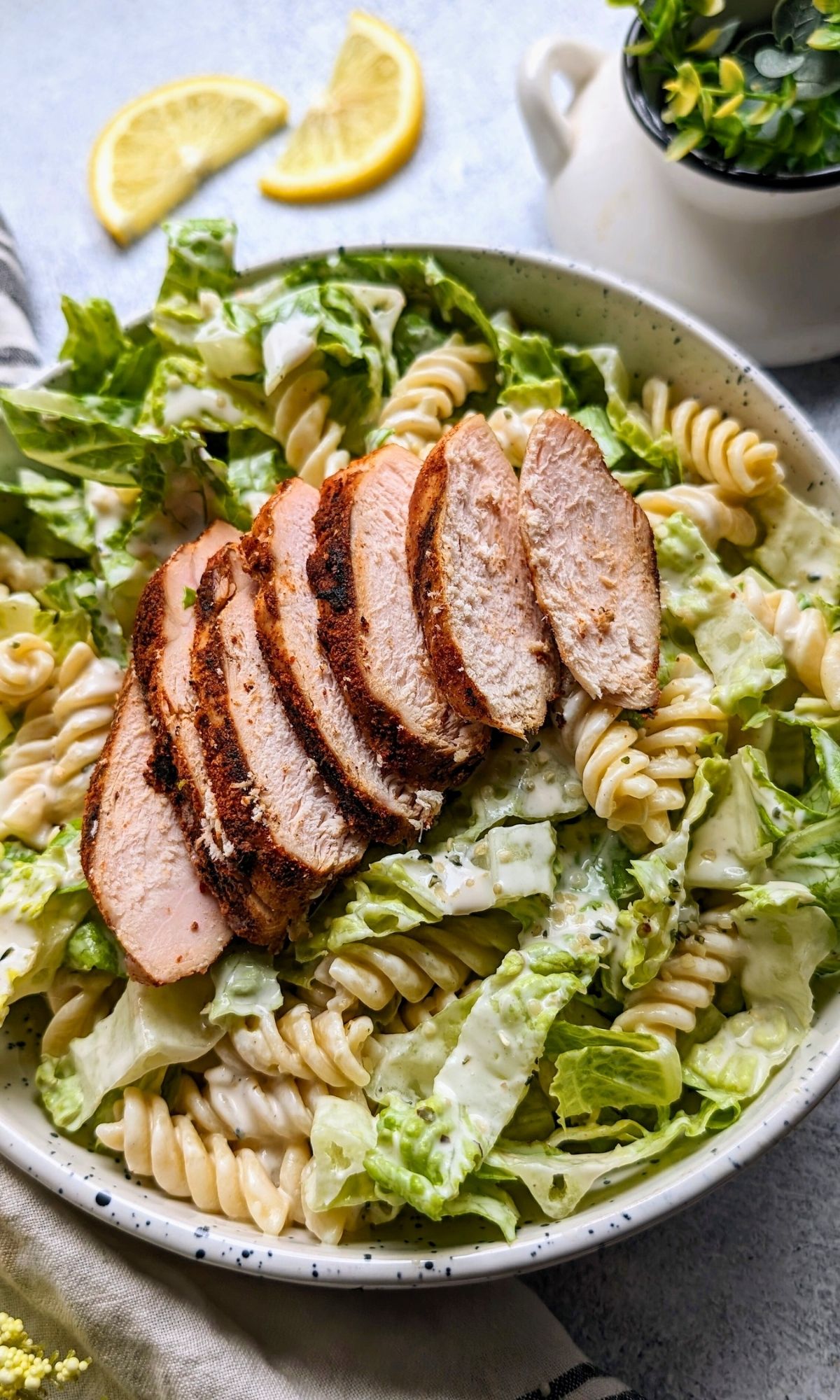 low sodium caesar salad recipe with grilled chicken with a no salt added spice blend in a bowl with fresh lemon juice