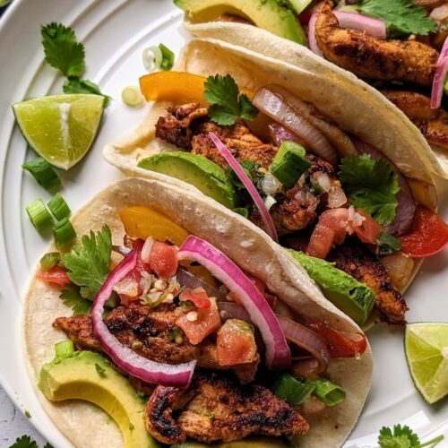 low sodium fajitas recipe with chicken bell peppers onions and salt free spices in corn taco shells