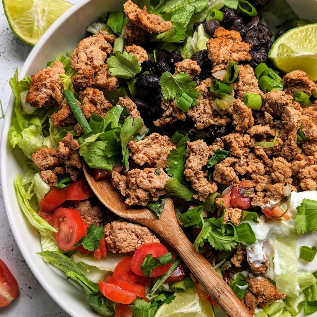 no salt taco salad low sodium taco meat and tomatoes and lettuce with a spoon