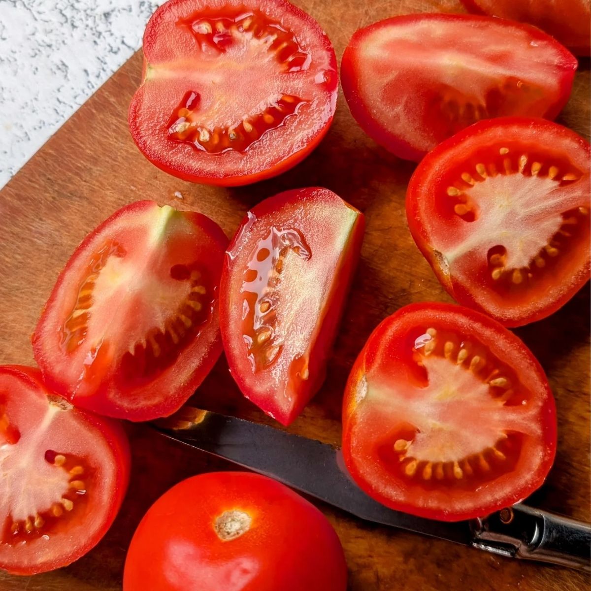 chopped tomatoes for a salt free salsa recipe that is made in a food processor.