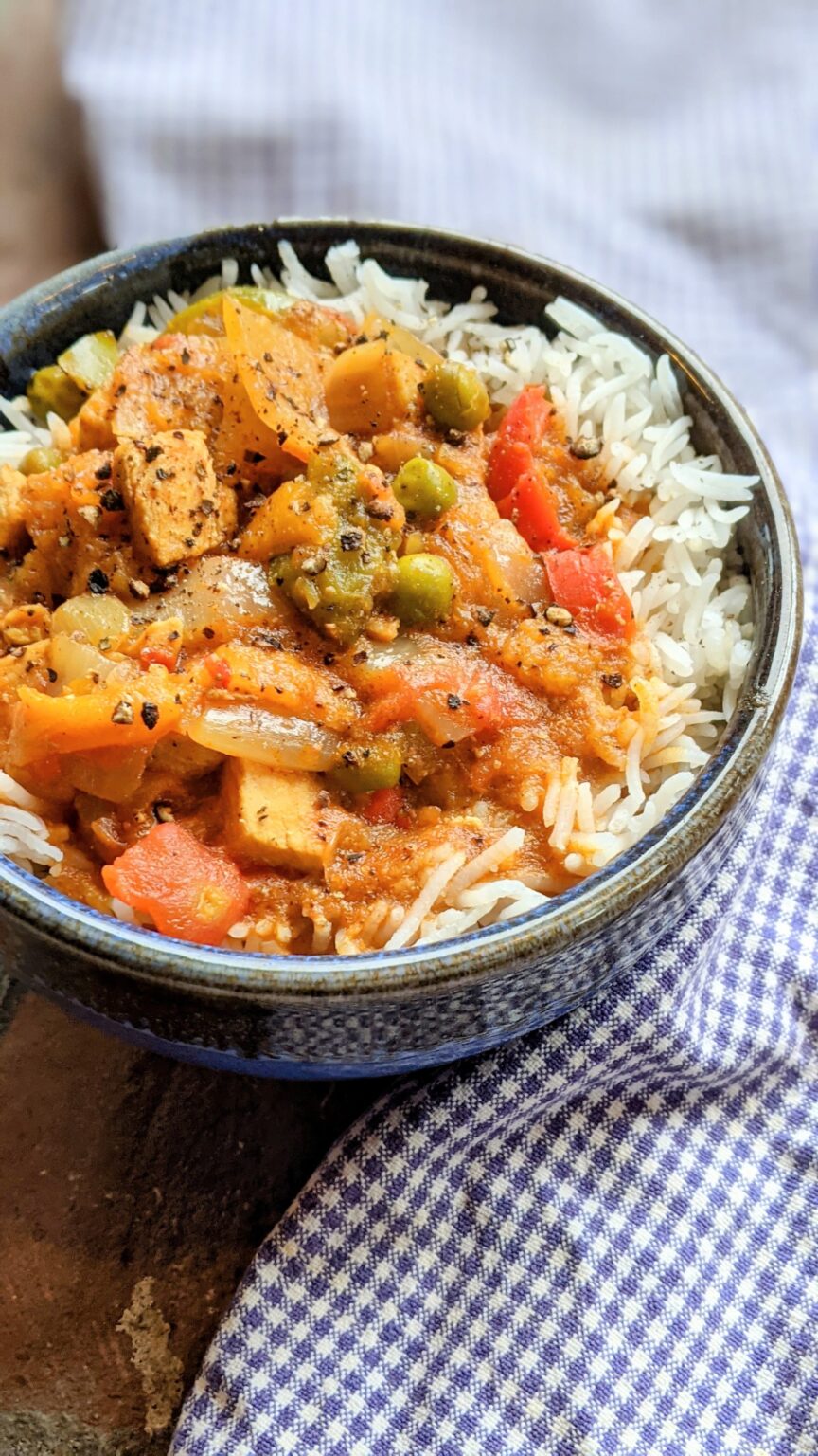 a bowl of low sodium chicken curry dinner recipe with vegetables and curry sauce