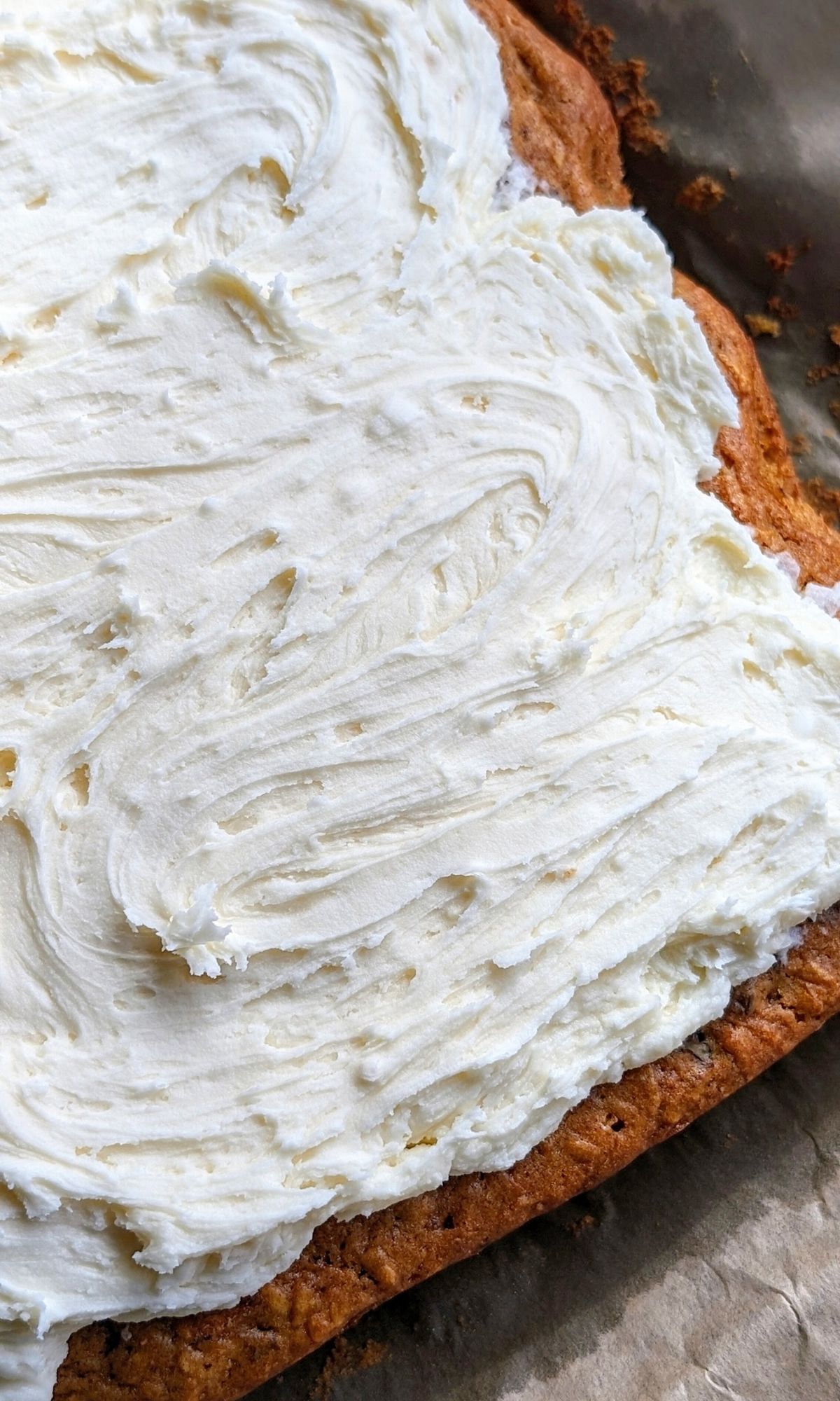 a large sheet cake with low sodium vanilla frosting made with unsalted butter and powdered sugar.