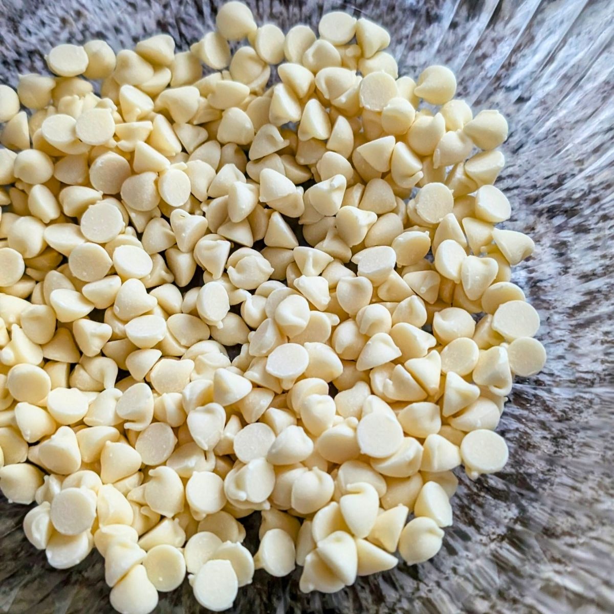 white chocolate chips in a bowl ready for the microwave to melt them