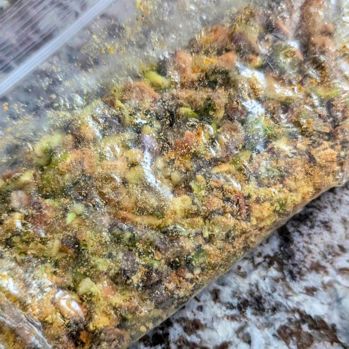 crushed pistachio nuts with cinnamon and sugar in a bag for the pretzel topping.