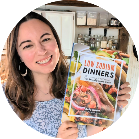 low sodium recipe developer with a cookbook in a kitchen