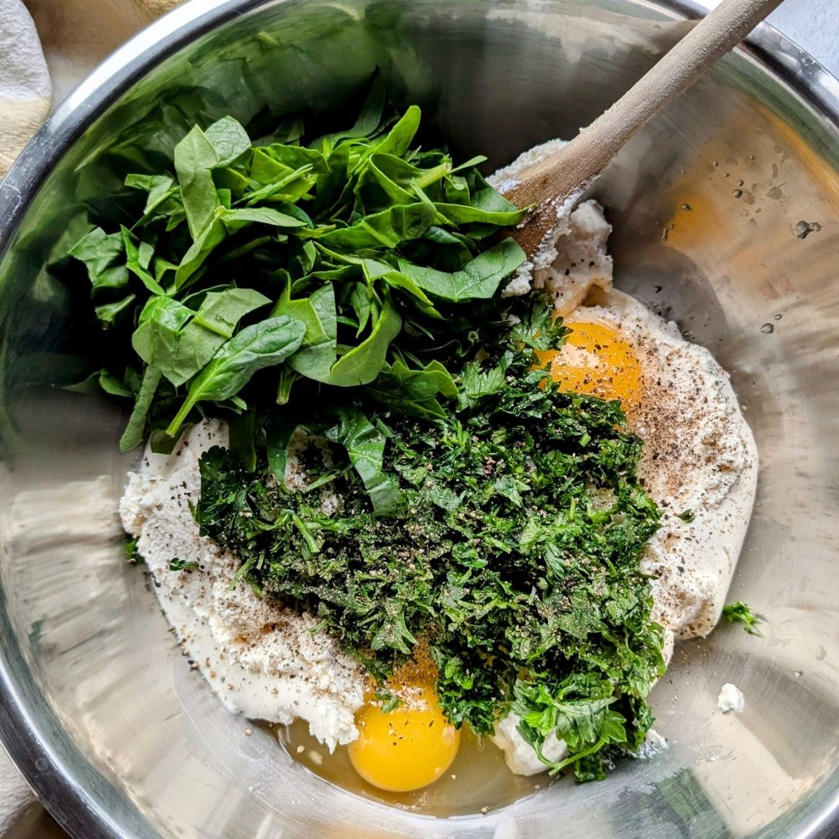 low sodium pasta filling for stuffed shells with ricotta cheese, eggs, spinach, and parsley.