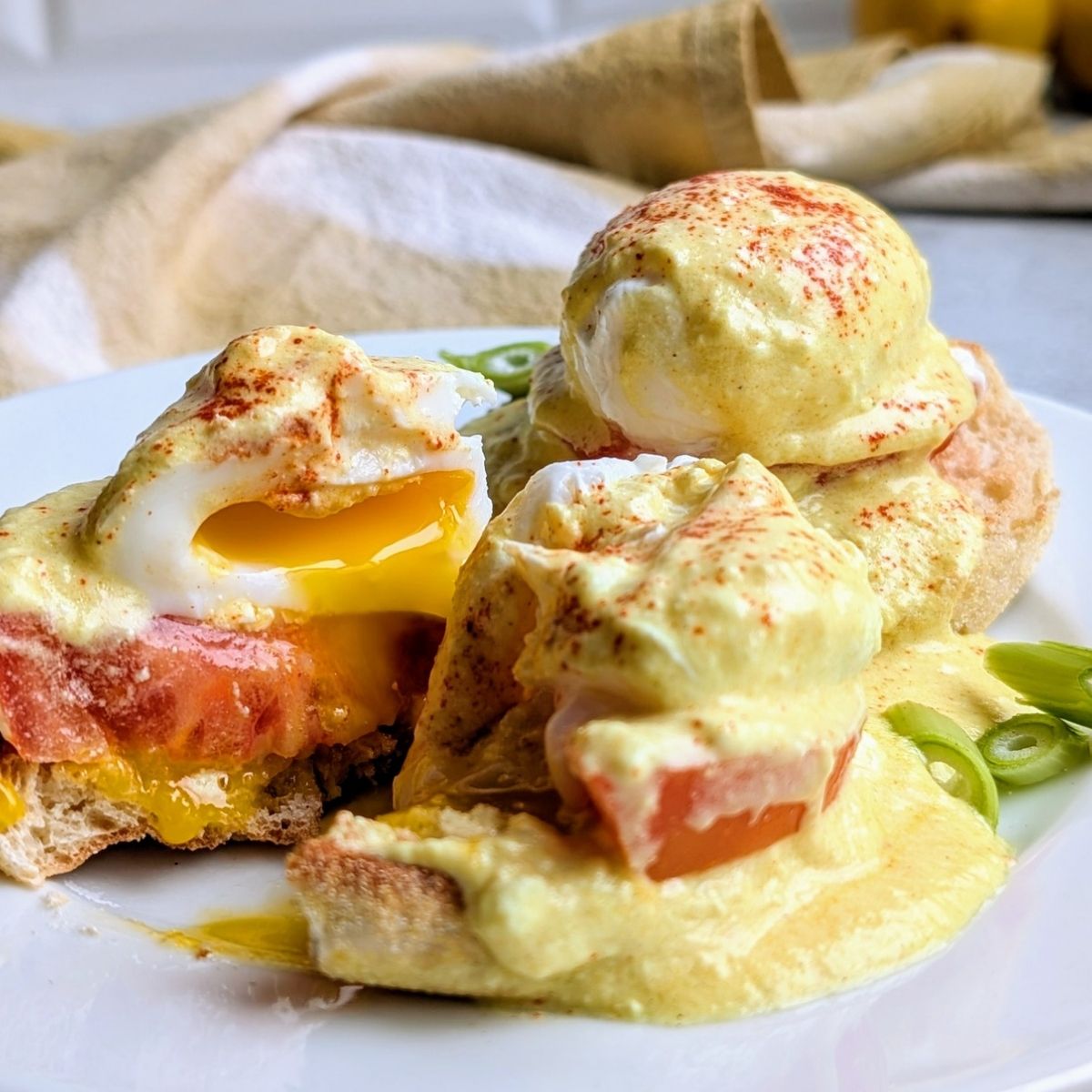 low salt eggs benedict with tomatoes and green onions