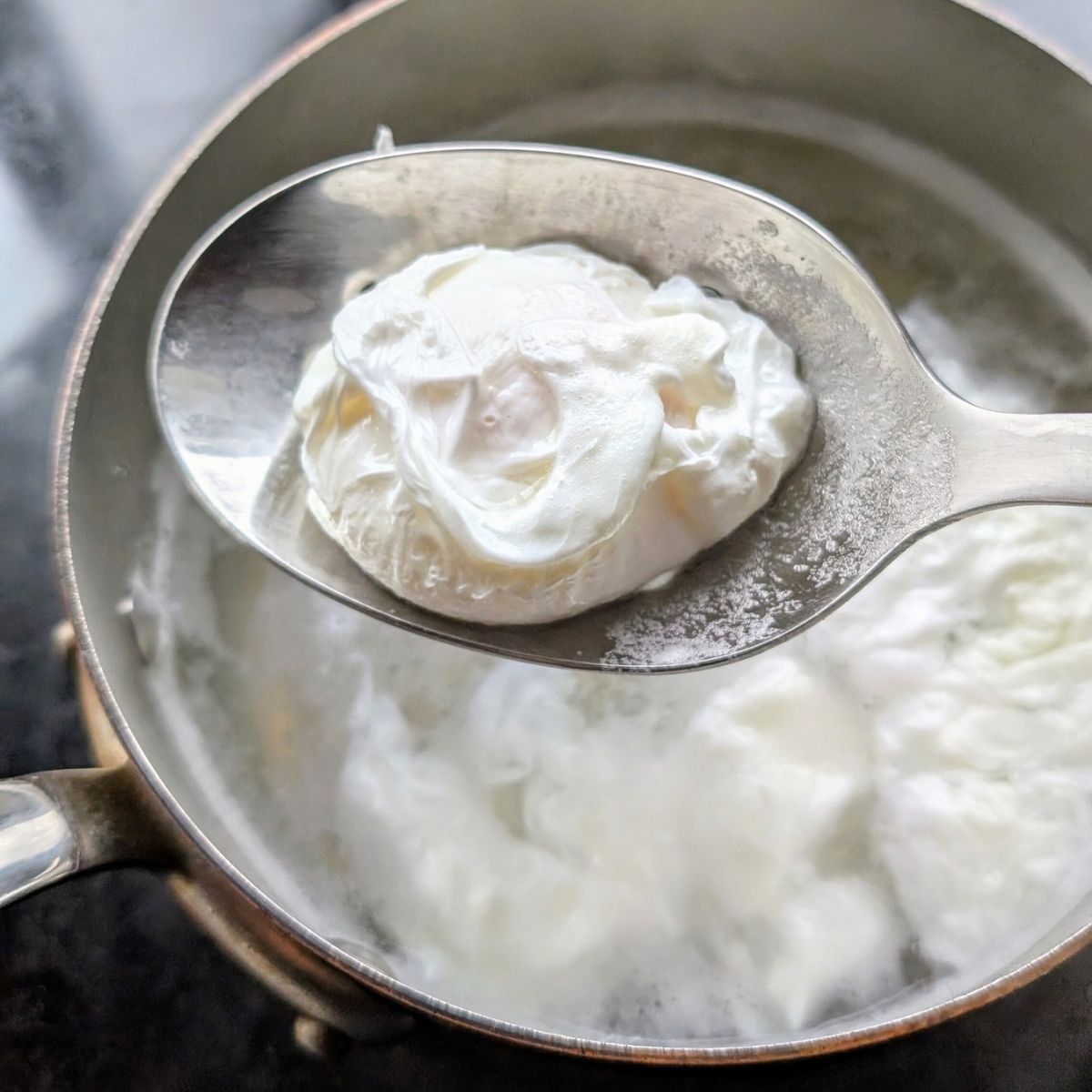 unsalted poached eggs for low sodium benedict with eggs and tomato and hollandaise sauce