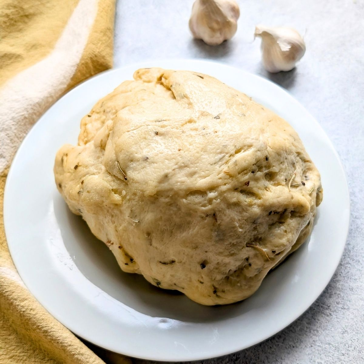 pizza dough doubled in size being baked for low sodium pizza.