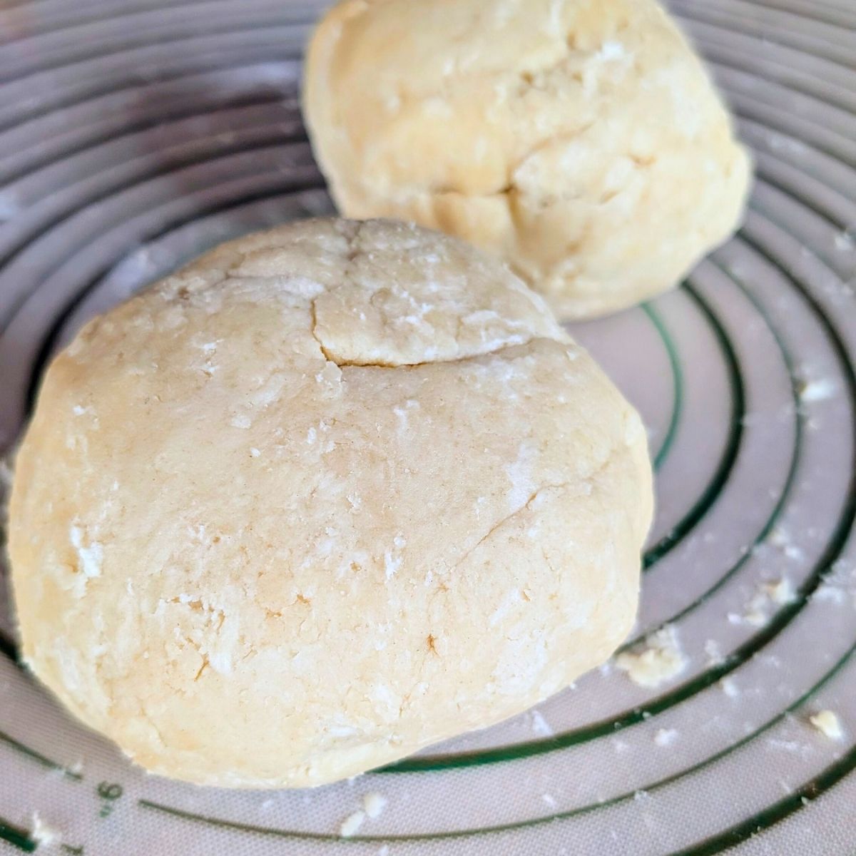 salt free pie crust recipe on a baking mat into two balls.