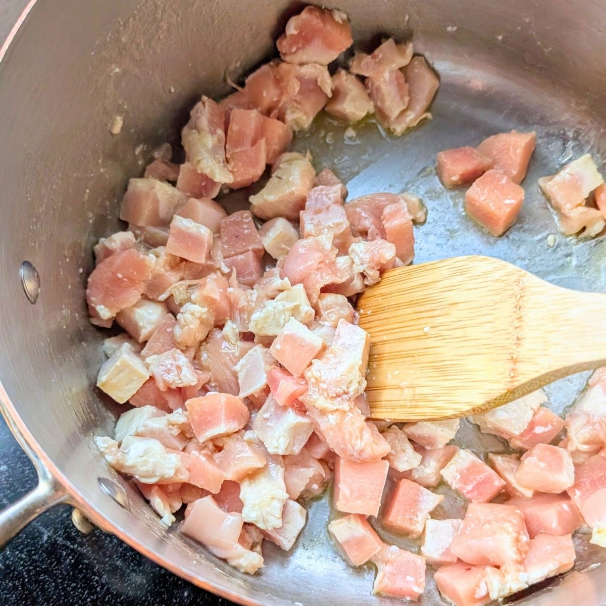 chicken breast cubed and cooking for pot pie filling