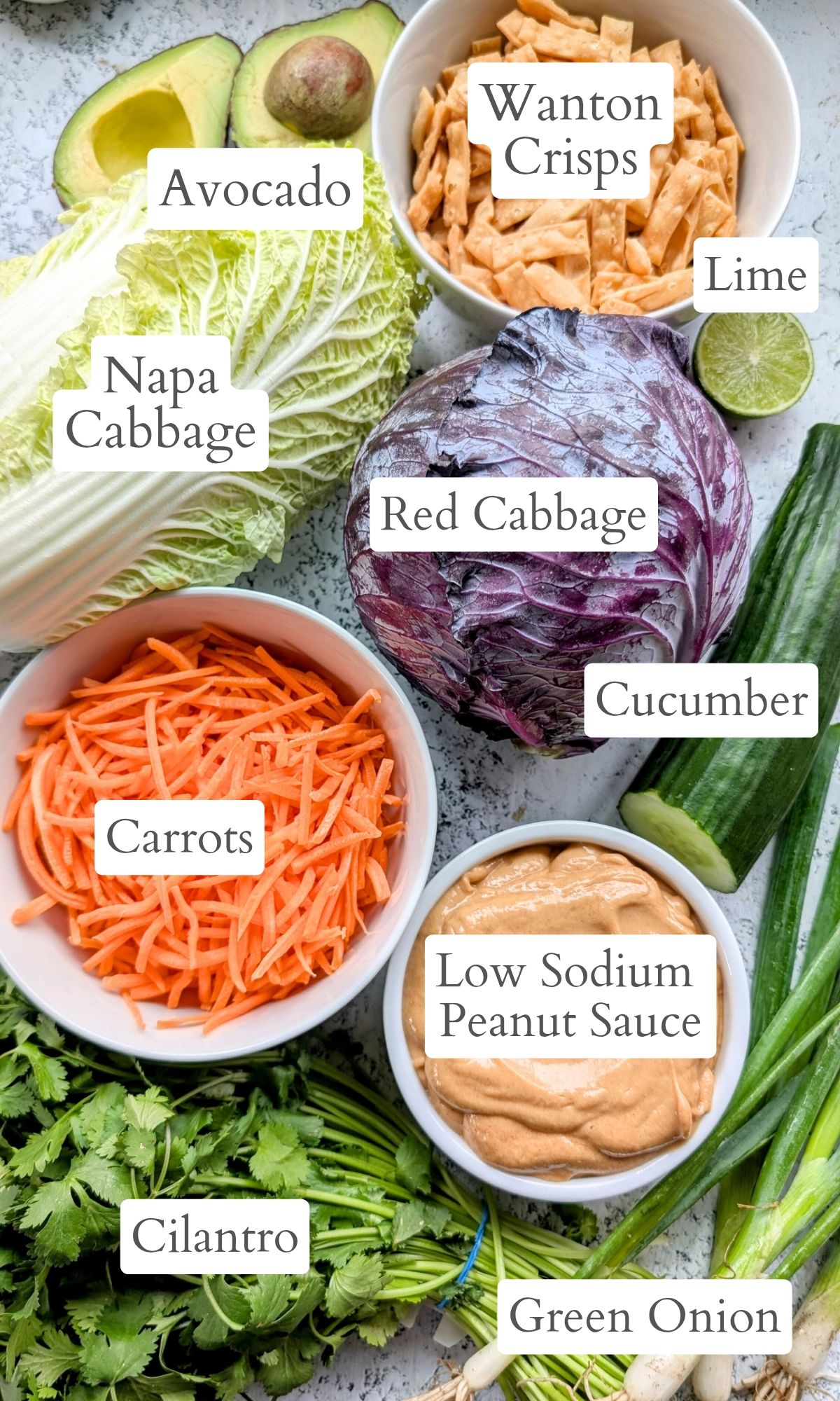 low sodium thai salad ingredients like cabbage, carrots, cilantro, green onions, and avocado.