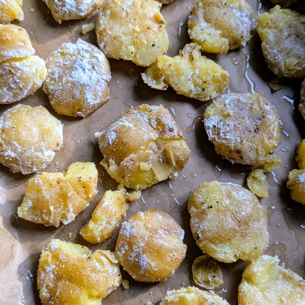 a sheet pan of low sodium potatoes being baked for crispy side dishes