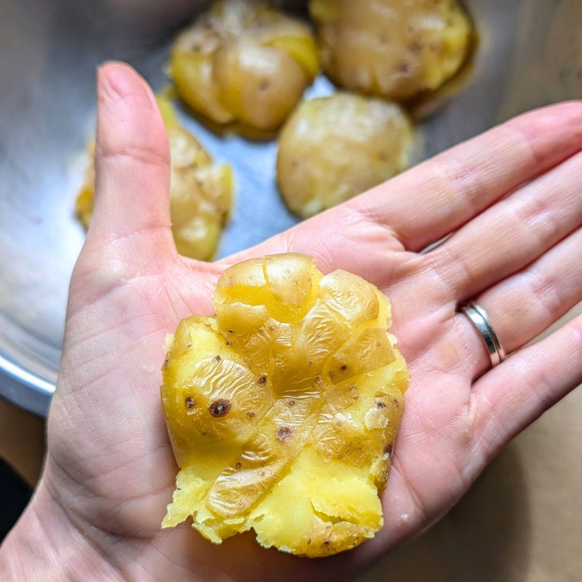 salt free smashed potatoes by hand smashing potatoes with your palms.