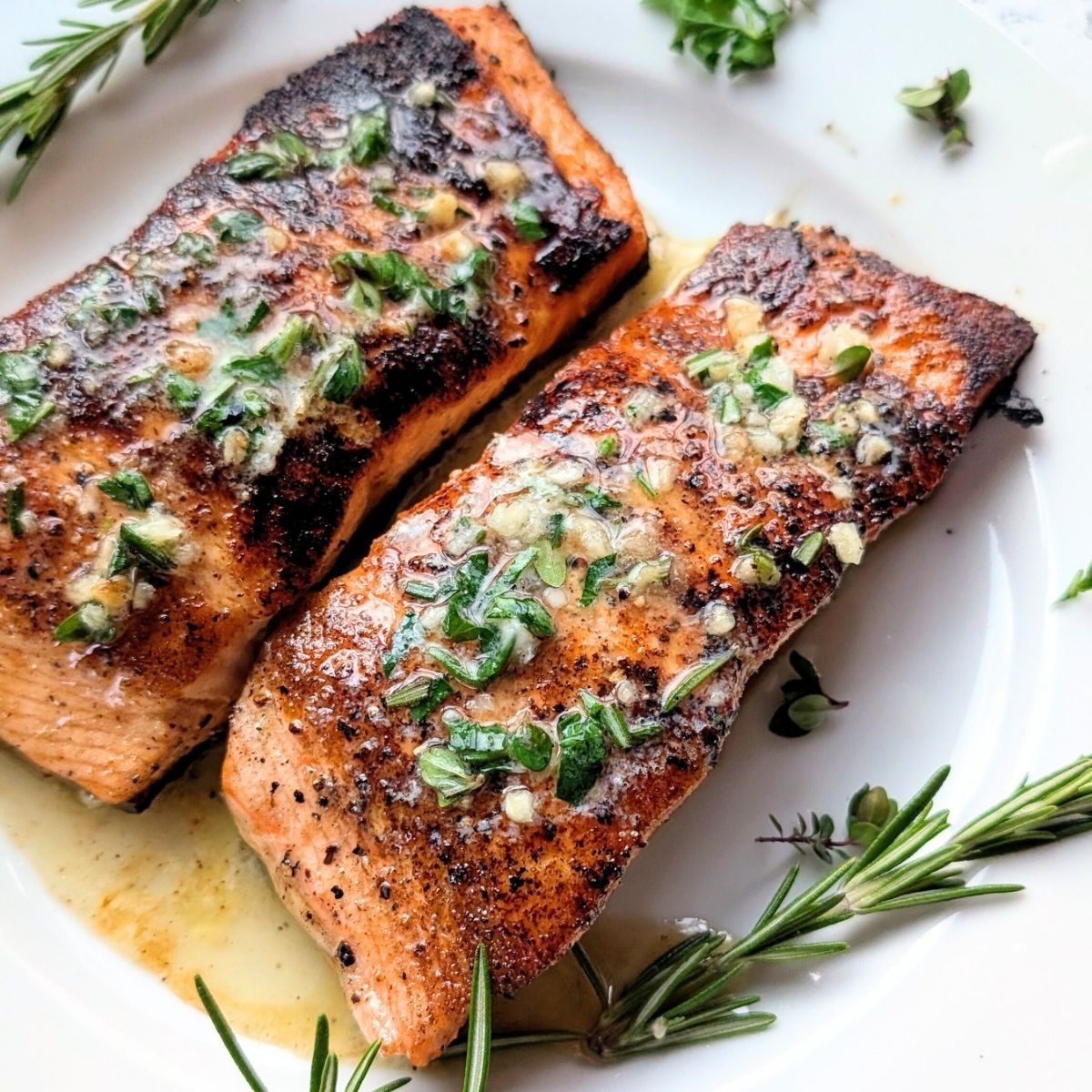 low sodium salmon fillets grilled and toped with lemon herb butter.