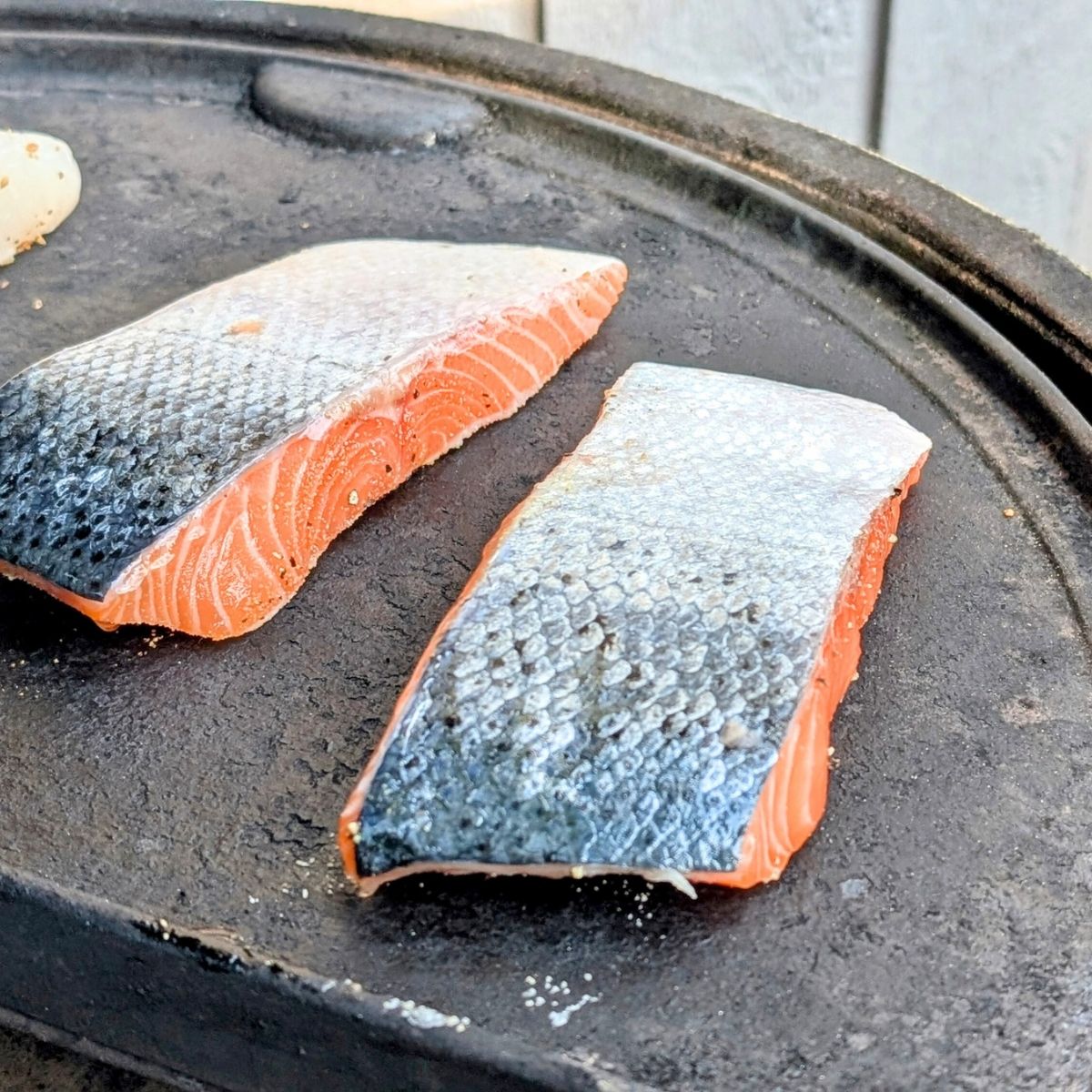 low salt salmon on the grill to get a char and grill marks on the flesh.