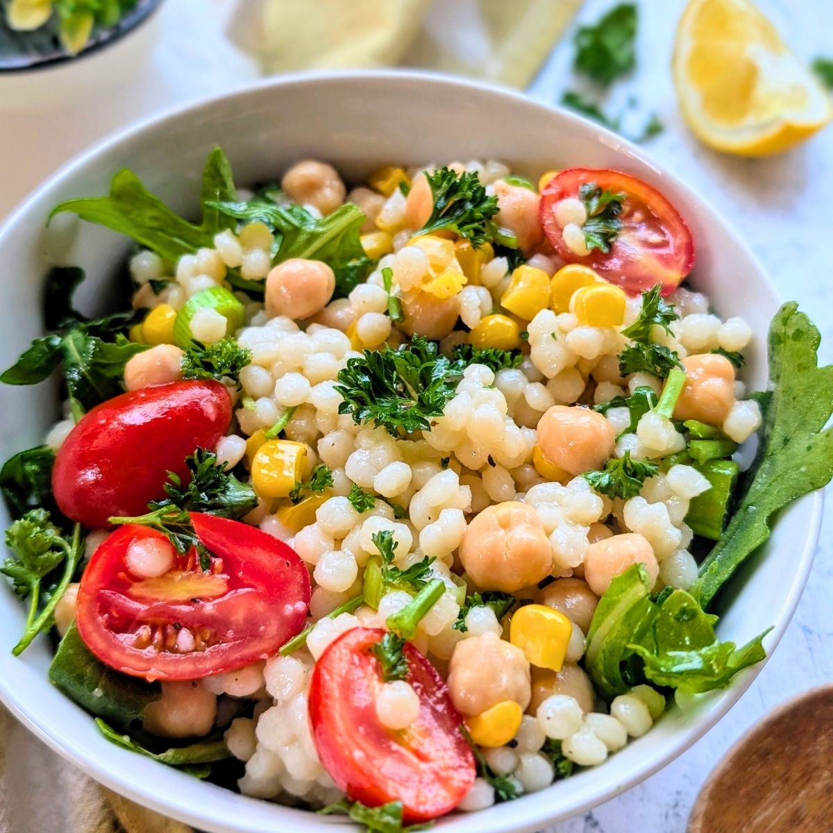 low sodium couscous salad recipe with tomatoes, arugula, and corn.