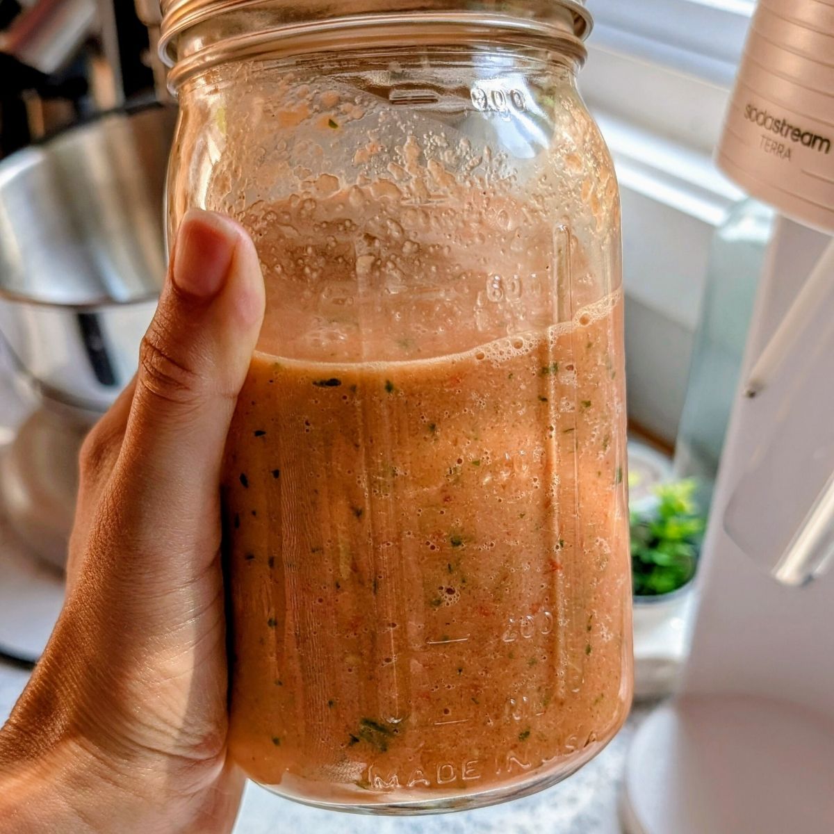 blended low sodium gazpacho without salt in a mason jar to chill in the refrigerator.