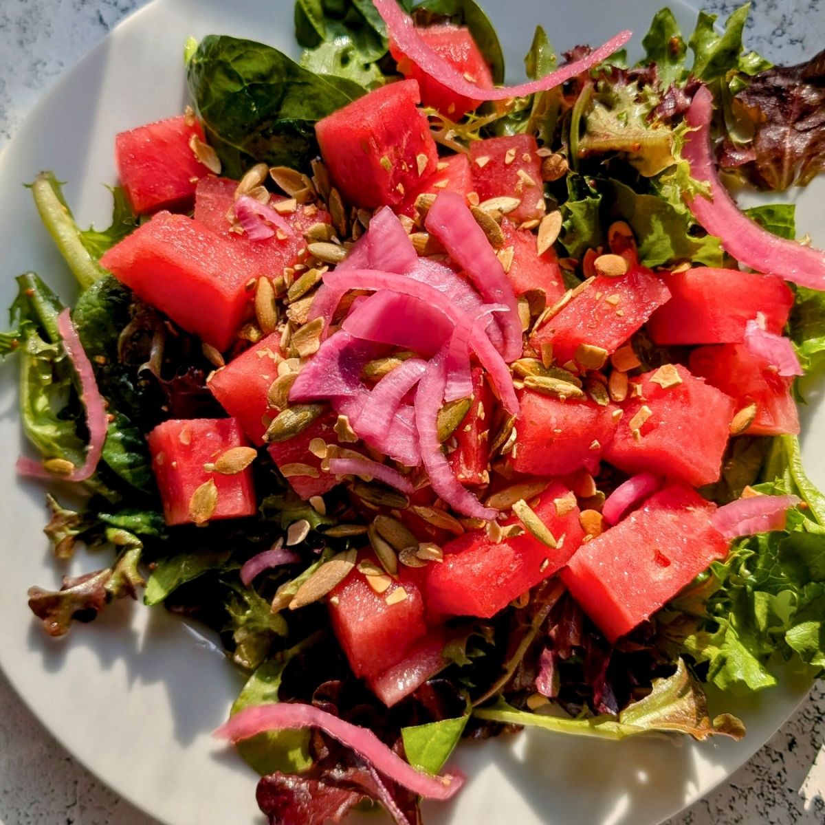 a plate of low salt watermelon salad low sodium salad with fruit.