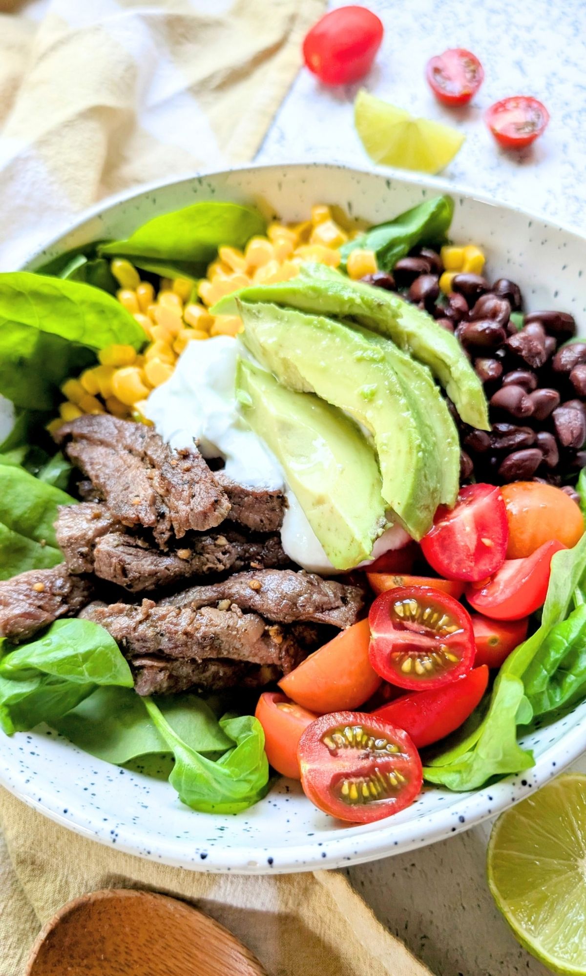 low sodium steak salad with avocado, sour cream, tomatoes, and lettuce.
