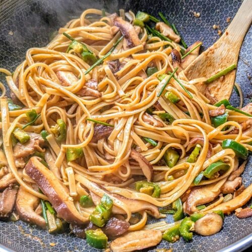 low sodium asian noodles in a bowl with green onions and mushrooms and hibachi sauce.