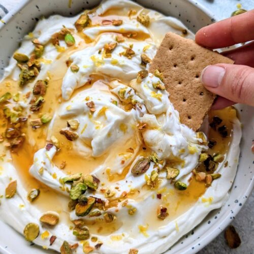 low sodium ricotta cheese and honey dip with a graham cracker for a low sodium snack