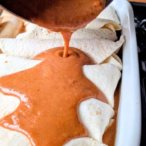 low sodium enchilada sauce recipe with salt free spices poured over beef enchiladas